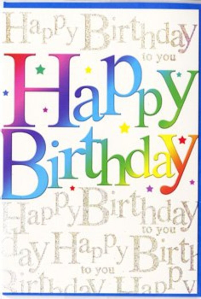 This birthday card presents itself like a burst of applause captured on paper, the kind of bright, joyful greeting you might pick up just after ordering a bouquet in an Aldershot florist. Across the front, the words Happy Birthday stand tall and proud, each letter rendered in a rich, velvety gradient of colour that sweeps through the spectrum. The tones glide from deep berry reds and magentas into ocean blues, vivid greens, and glowing yellows, blending as smoothly as petals in a mixed birthday bouquet. The shading inside each letter adds a sense of dimension, giving the impression that the text is gently raised from the surface, ready to leap forward with enthusiasm. Surrounding the main message, tiny colourful flecks and soft starbursts pepper the space like scattered confetti on a party table set in a cosy Aldershot home. Behind this animated typography, the entire background is filled with graceful golden script, endlessly repeating the words Happy Birthday to you in a looping, almost musical pattern. The gold ink gleams subtly, a little like early evening sunlight catching the edges of leaves in Manor Park, offering a refined counterpoint to the bold, rainbow lettering. The card's finish appears smooth and slightly lustrous, giving the design a polished, celebratory feel. Together, the vibrant front message and the shimmering background create a sense of genuine festivity, as if you can almost hear a chorus of friends singing. It feels like a card chosen for someone who deserves not only a simple wish, but a full-hearted celebration that lights up their special day in Aldershot.